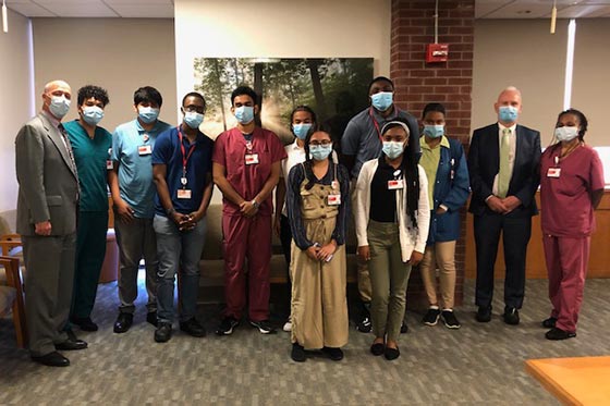 NYP-Lawrence-Interns-560×373